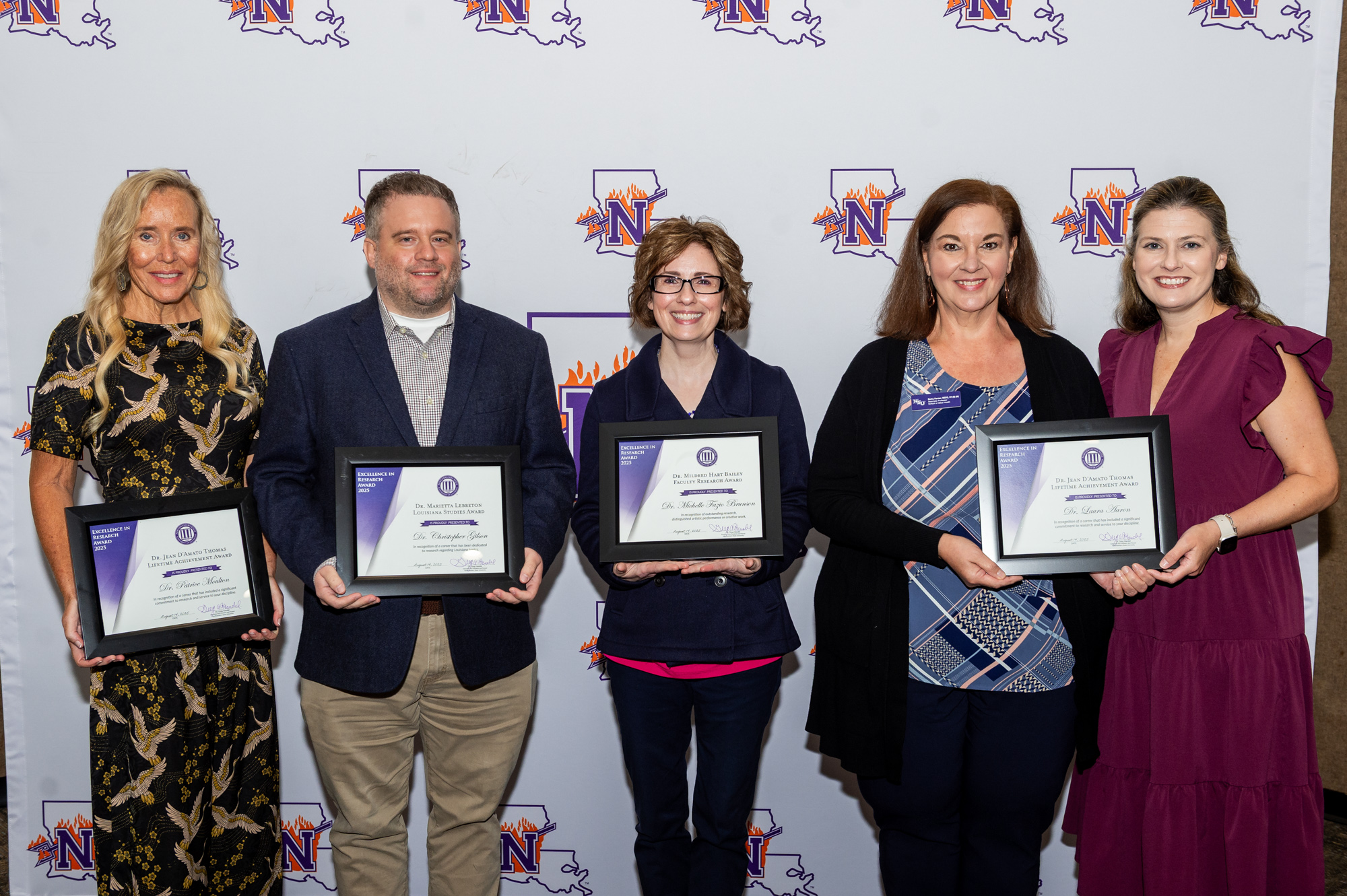 NSU faculty recognized for outstanding research were, from left, Dr. Patrice Moulton, Dr. Christopher Gilson, Dr. Michelle Fazio Brunson and, representing Dr. Laura Aaron, colleagues Becky Farmer and Dr. Kari Cook.