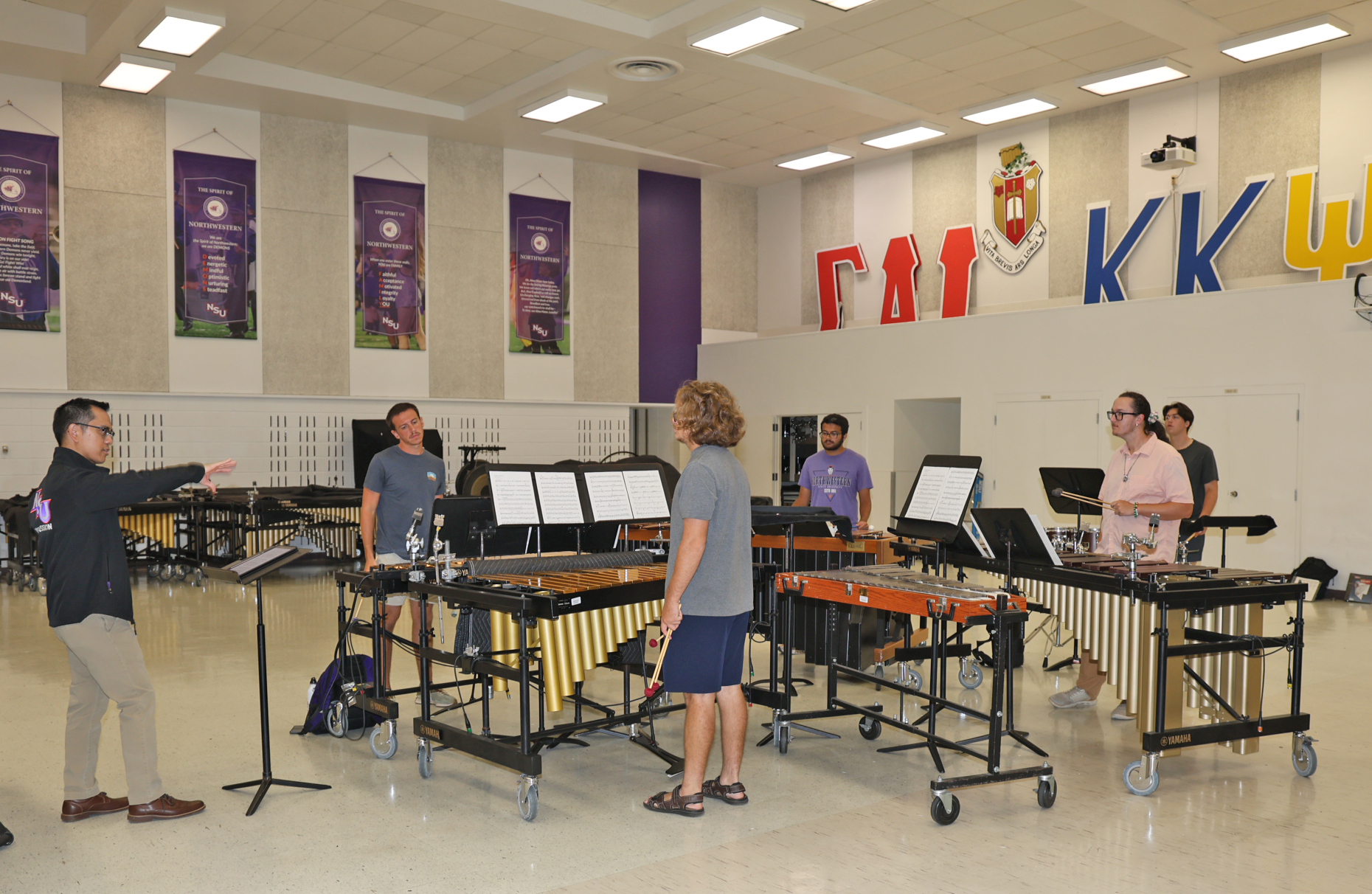 Dr. Oliver Molina leads a percussion class with students Mason Windham, Cademon Larson, Jacob Naqvi, Mars Heard and Peyton Johnson. Molina received a Fulbright Award to live and study at the University of the Philippines College of Music January-June 2027.