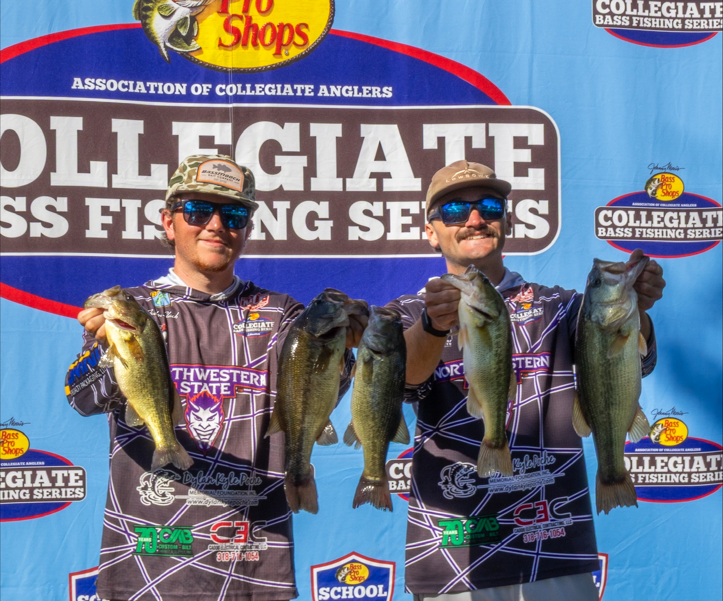Northwestern State University Fishing Team members Ayden Slack, left, and Daniel Gallagher display their catch at the AFTCO Collegiate Bass Open on Lake Dardanelle in Russellville, Arkansas.
