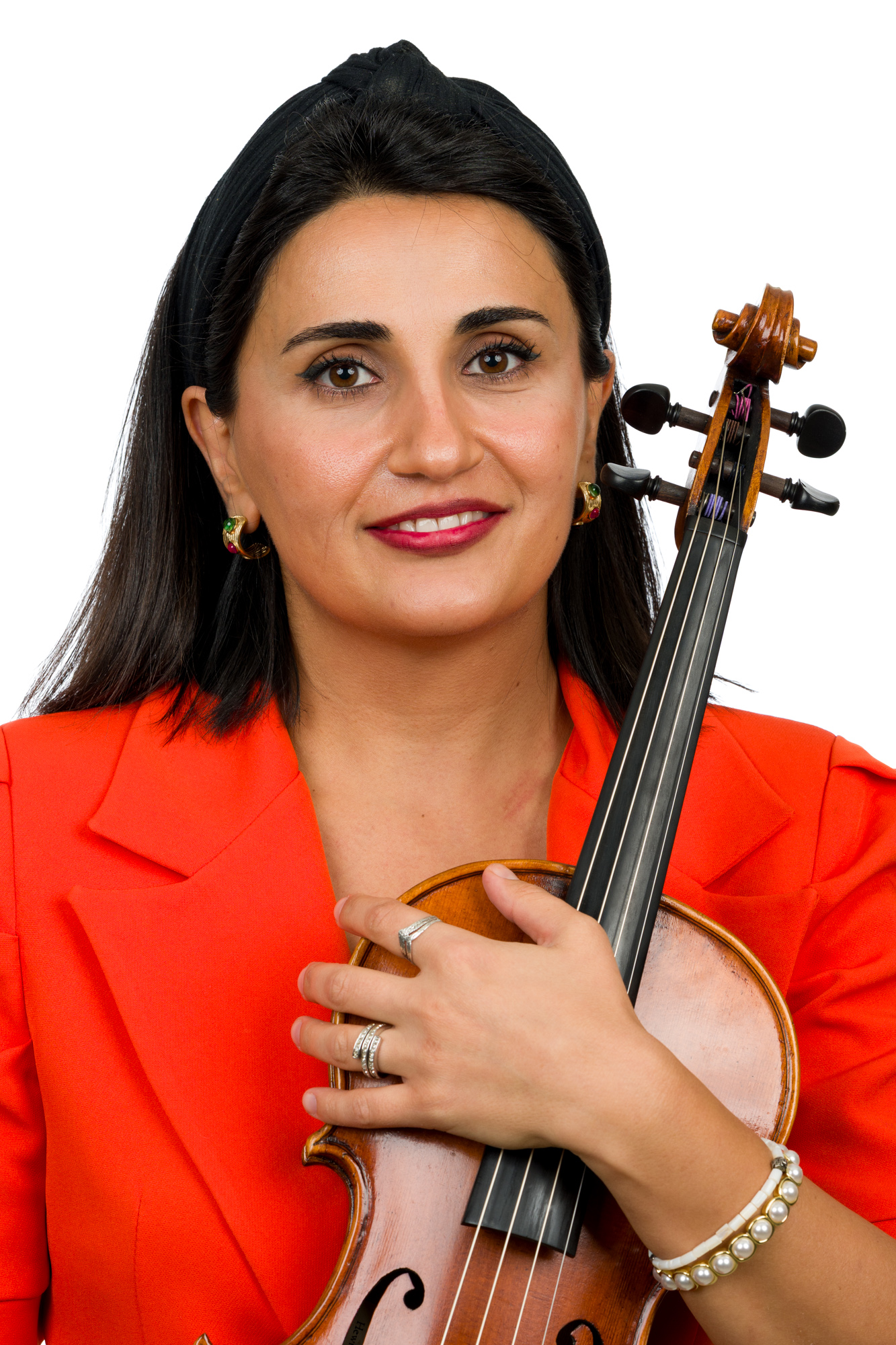 Sofiko Tchetchelashvili holding an instrument in a headshot