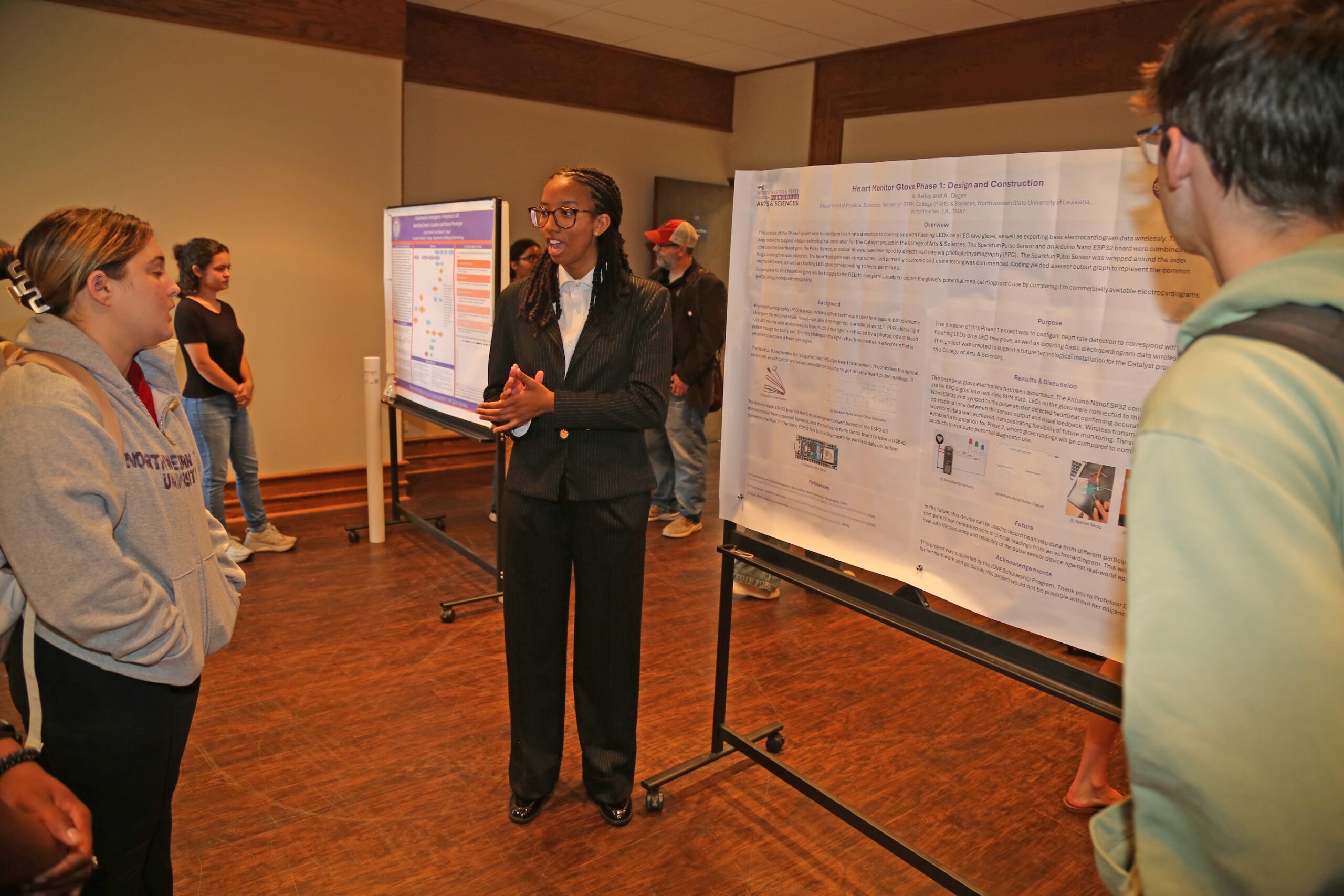 Raylon Bailey of Bossier City was one of dozens of undergraduates who presented during Northwestern State University’s 39th annual Research Day. Bailey’s project, “Heart Monitor Glove Phase 1: Design and Construction,” focused on configuring heart rate detection to correspond with flashing LEDs on a LED rave glove and exporting basic electrocardiogram data wirelessly. Bailey is an undergraduate majoring in biology/microbiology with Dr. Anna Dugas as faculty mentor.