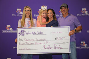 A portion of proceeds from the Dylan Kyle Poche Memorial Bass tournament will go to the Cure Sanfilippo Foundation in honor of Lydia Rachal. From left are Shelley Poche, Lydia and Morgan Rachal and Burt Poche.