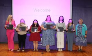 NSU Secondary Education majors were recognized with Apple pins. From left are Avery Phillips, Hailee Addison, Catheryn Busha, Ryan Conley, Rhyan Floyd, Emma Penfield and Dr. Jessica Church.