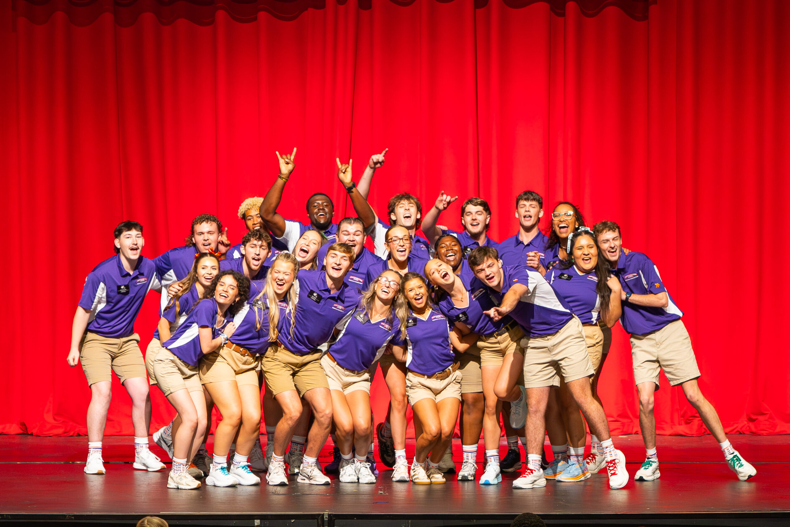 Freshman Connectors posing on stage