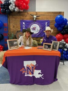 Sydnie Romero and NSU Rodeo Coach Cody DeMoss