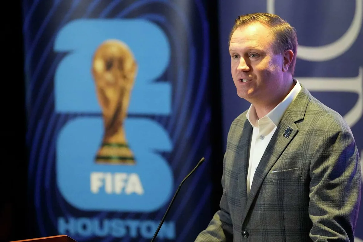 man speaking at a podium
