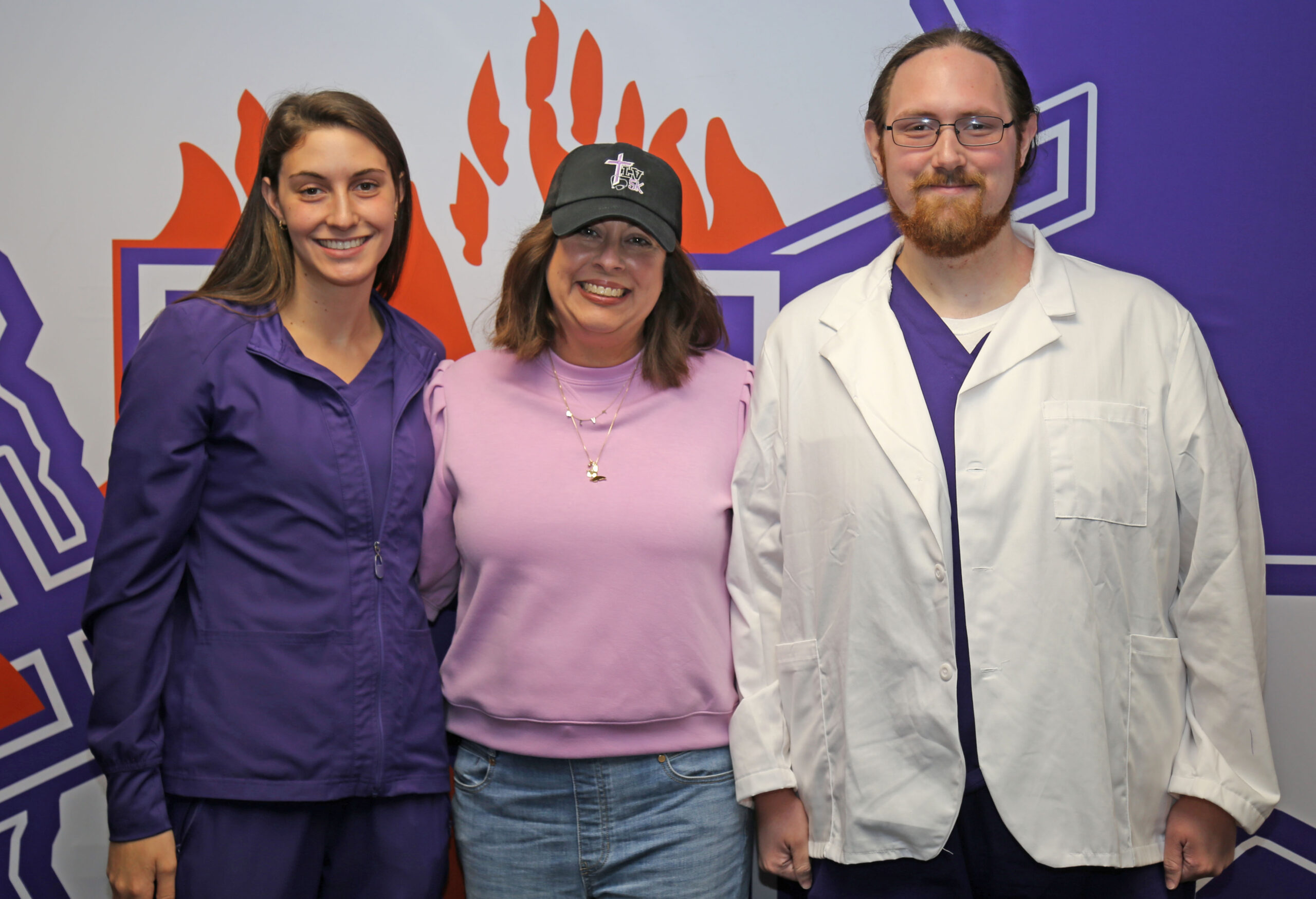 Alexander Guillory, right, was named the 2026 recipient of the Lauren Vaughn Memorial Scholarship, presented to a students enrolled in NSU’s accelerated BSN program at the Alexandria-Cenla Campus. Bridget Vaughn, center, presented the award and recognized last year’s recipient Jesci Lord, left, who will graduate in August.