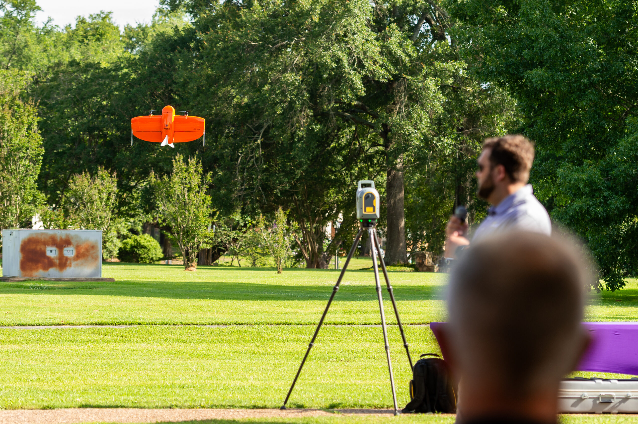 An instructor demonstrated the capabilities of a Wingtra Drone in flight during an exhibition at NSU.