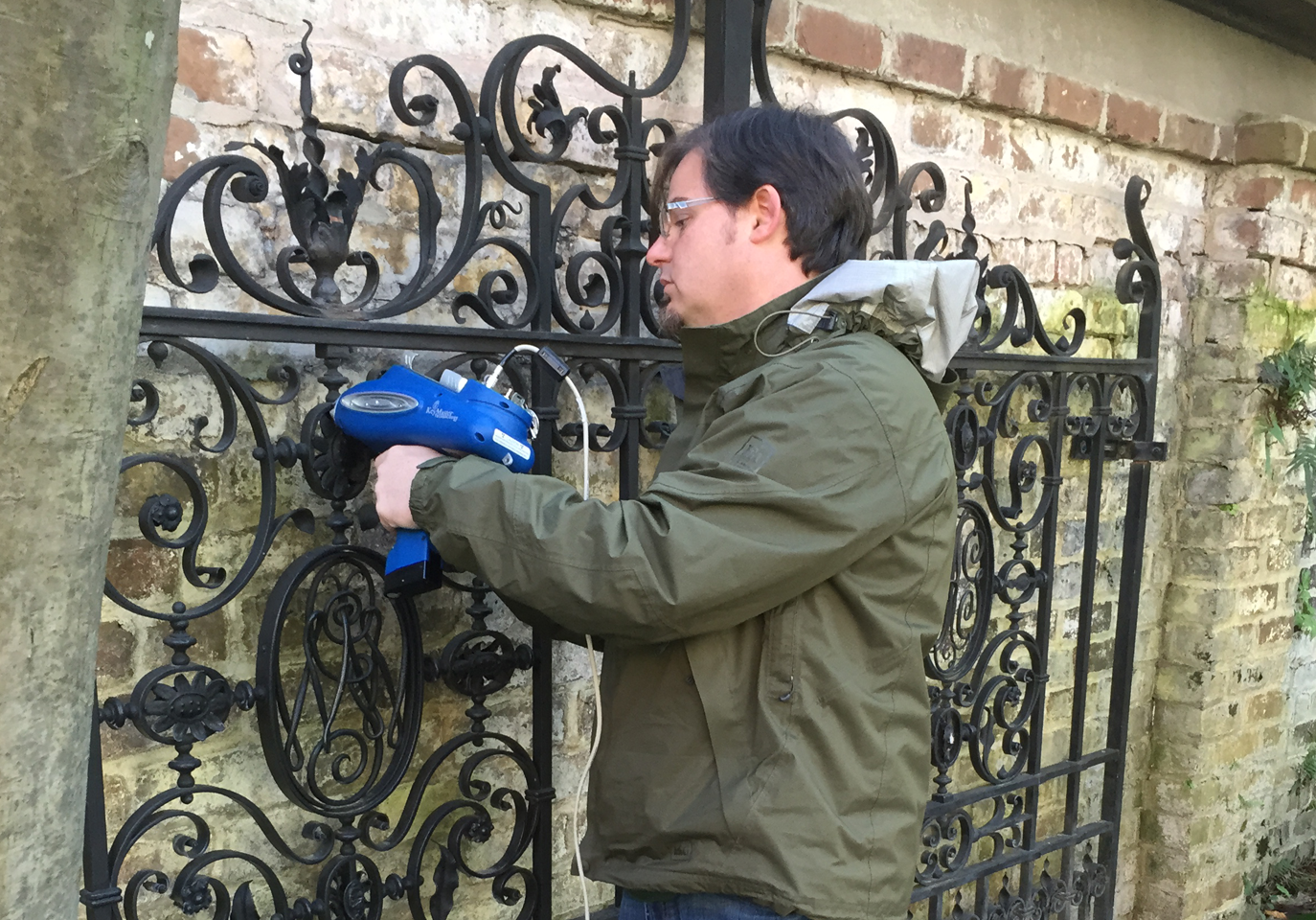 Man working on a gate